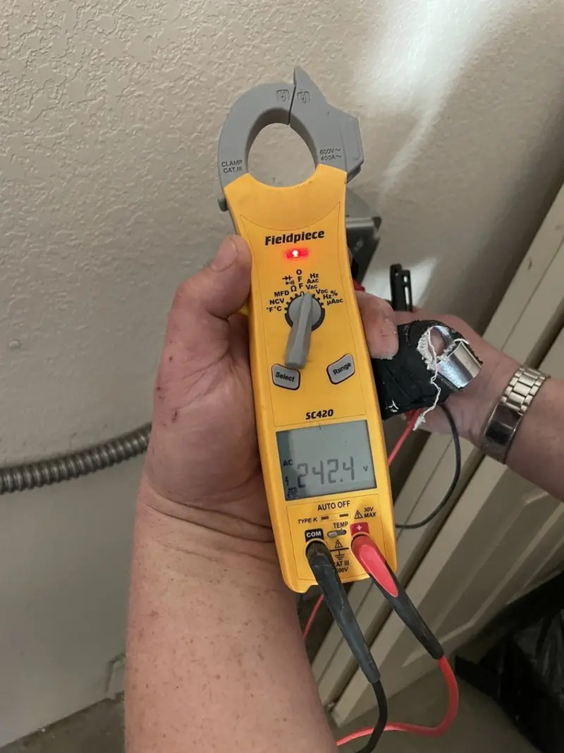 Voltage testing with clamp meter during Hot Tub / Pool Electrical Wiring in Trussville